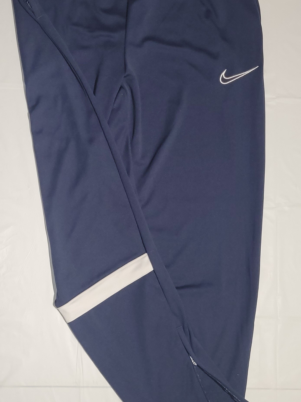 Nike Men's Navy Blue Track Joggers with White Swoosh Size Large